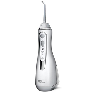 Die Cordless Plus Munddusche zum Reinigen und Reinigen von Zahnspangen und kieferorthopädischen Geräten